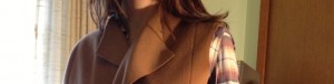 Notice the details: an extra seam on the shoulder adds interest to a solid colored coat.